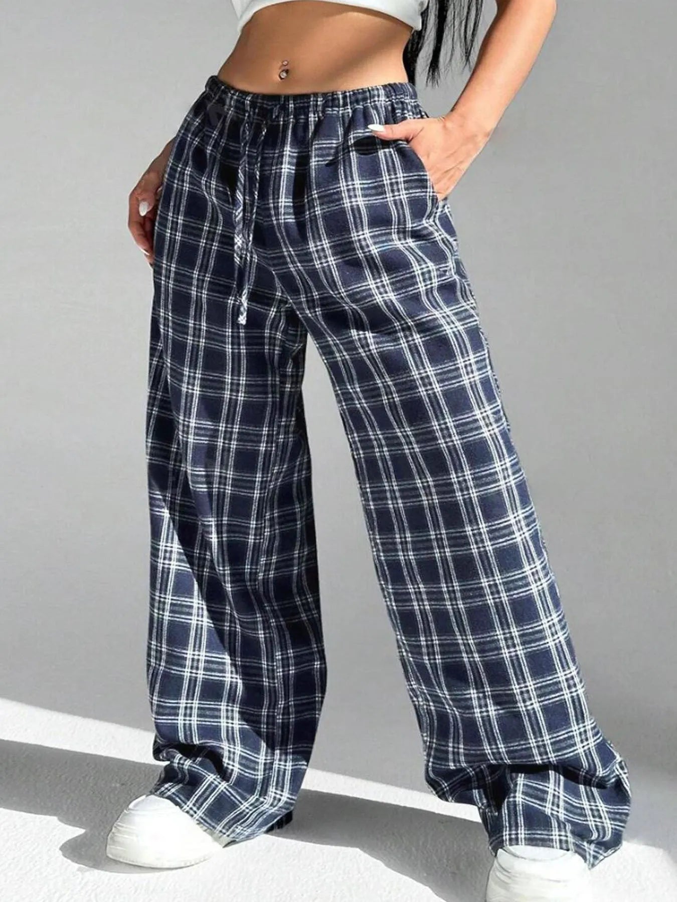 Women's red casual trousers with drawstring waist and plaid pockets in loose fit