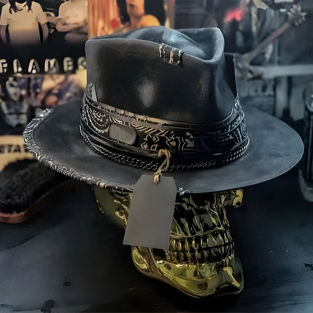 Handmade wool felt denim skull hat with a black conical crown on a white background.