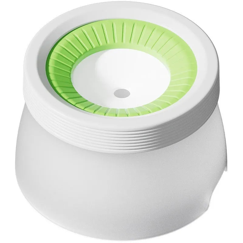 Blue suspended pet water bowl for dogs and cats on a white base plate, showing non-spill design.