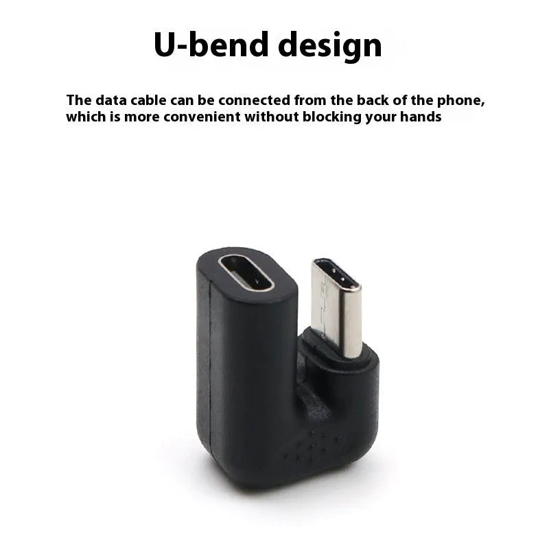 Set of four plastic USB male to female adapter extension cables with U-bend design on white background.