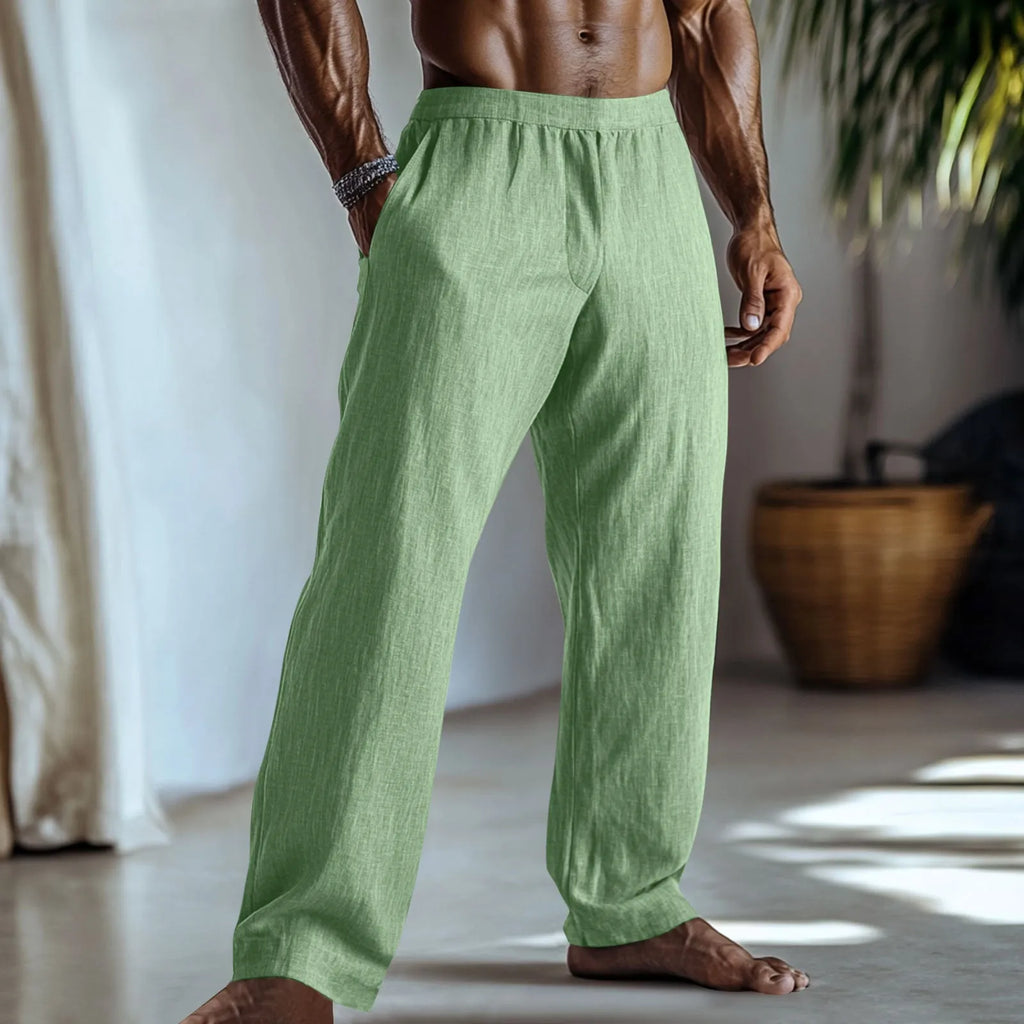 Men's straight leg casual trousers in light green cotton and linen fabric with visible pockets