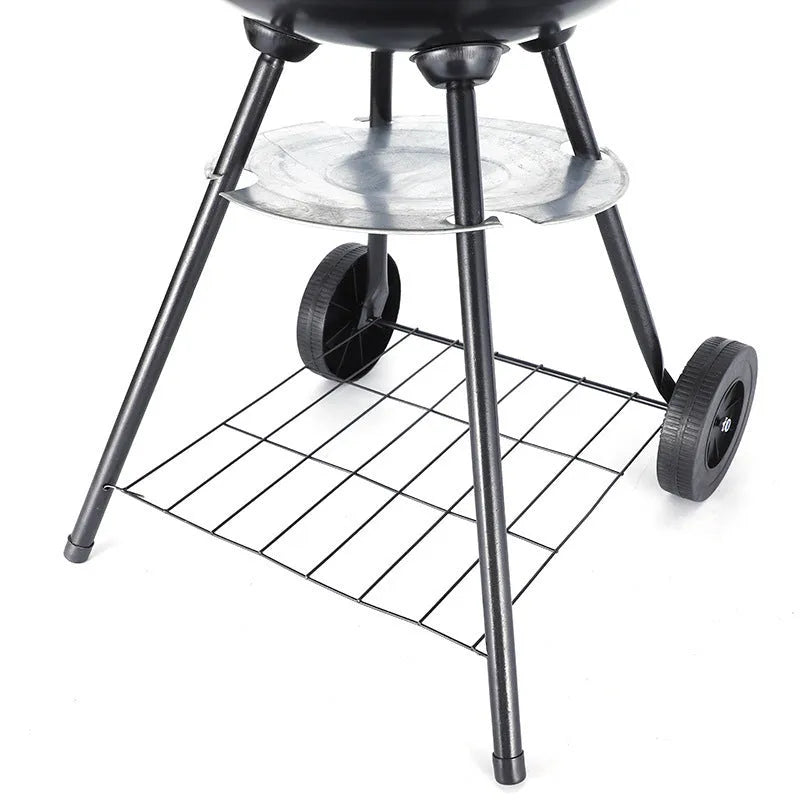 14-inch portable barbecue oven with iron apple stove design on grass