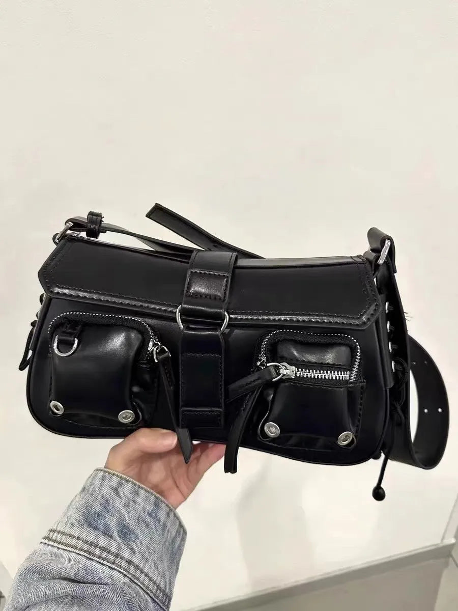Black structured PU leather women's baguette messenger bag with adjustable long shoulder strap.