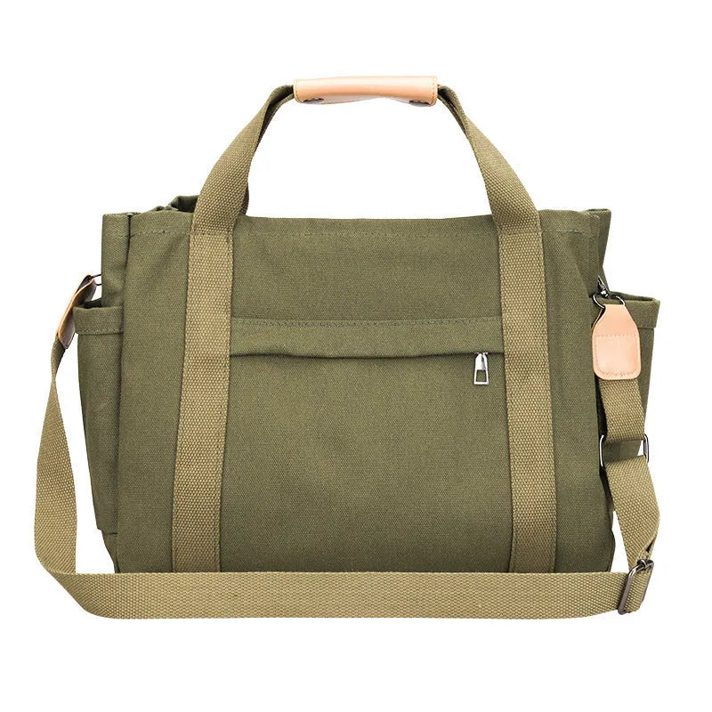 Large khaki canvas tote bag for women with open top showing internal laptop and camera pockets