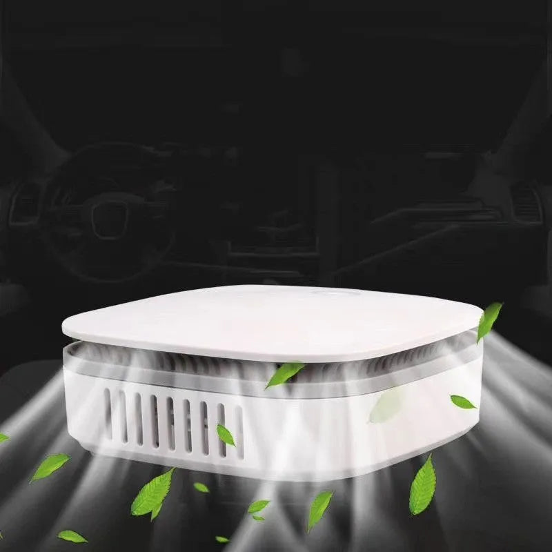 White USB-powered car air purifier with button control for air disinfection.
