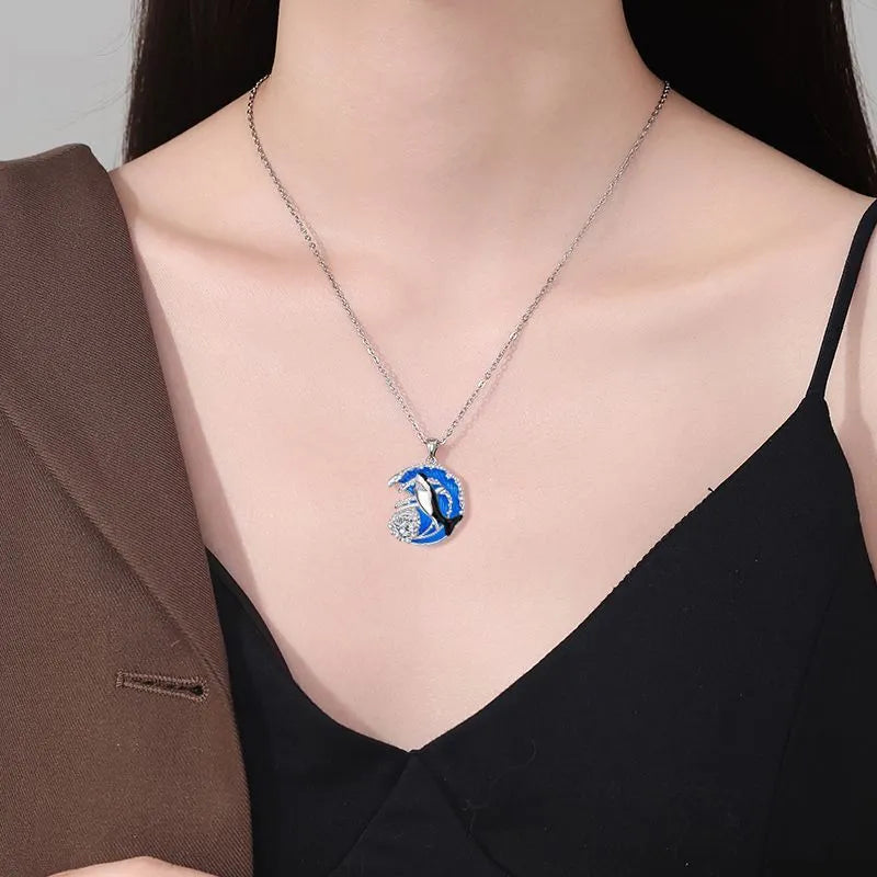 Women's copper shark necklace with cross chain design showing animal pendant and adjustable length