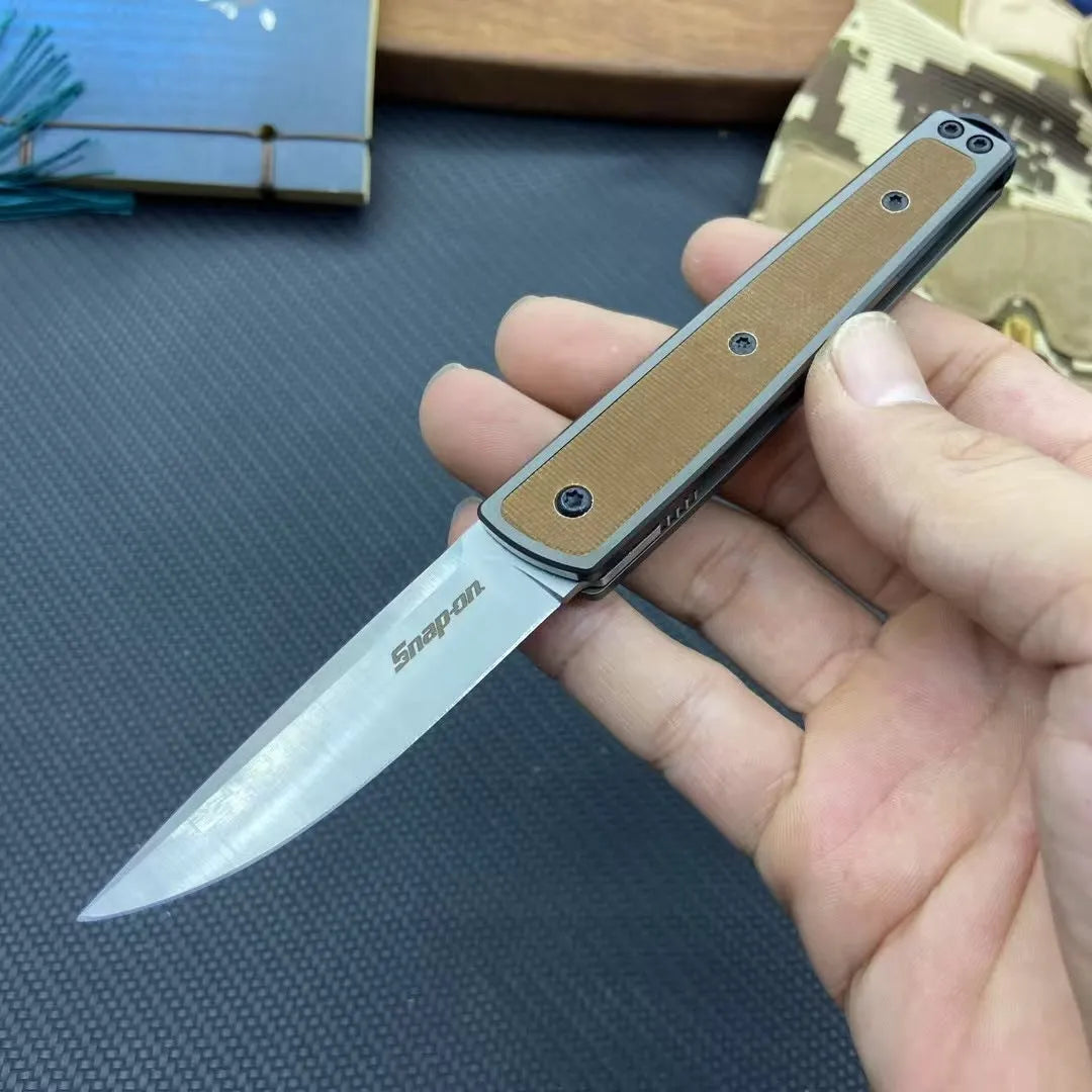 Folding fruit knife with stainless steel blade in black, red or coffee colour options, shown open to 17cm total length