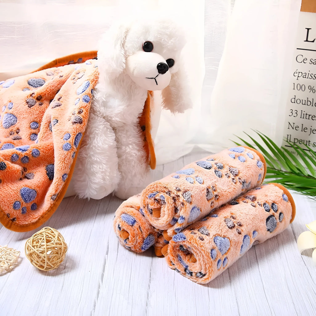 Coral fleece dog blanket with paw print design in multiple colour options and sizes