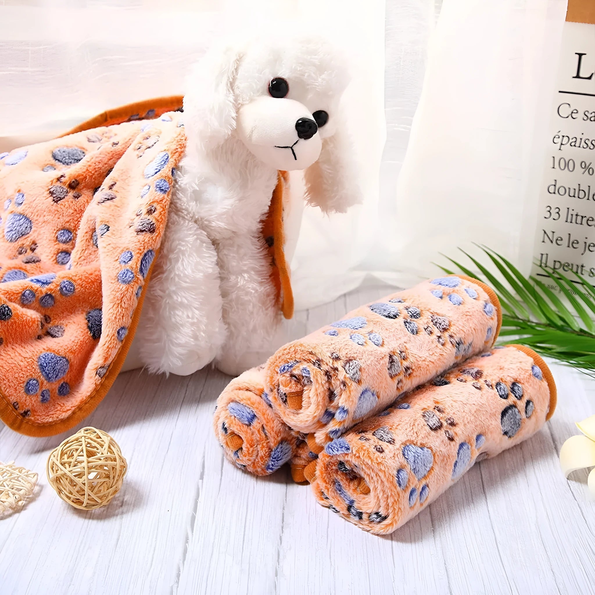 Coral fleece dog blanket with paw print design in multiple colour options and sizes