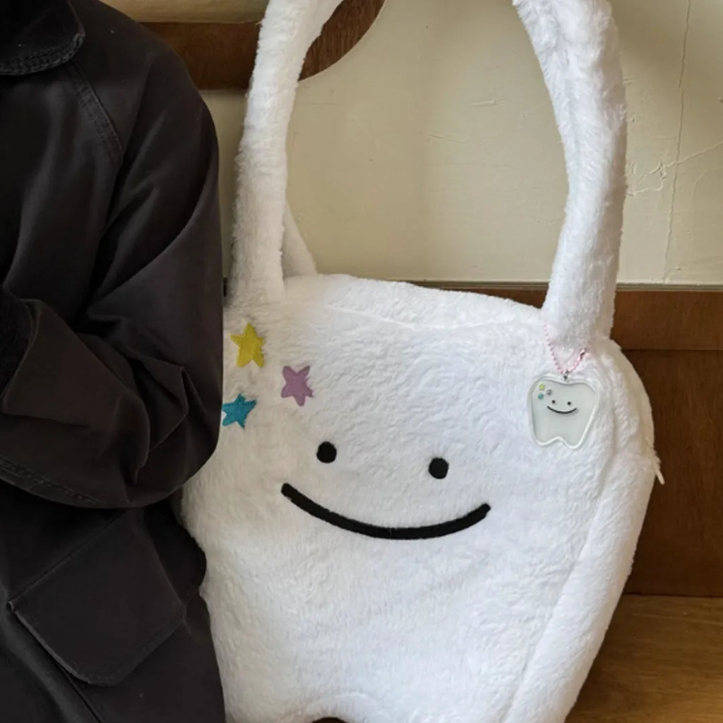 White plush shoulder tote bag with cute teeth pattern and zipper opening
