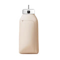 White cylindrical foldable laundry drier with remote control on flat surface