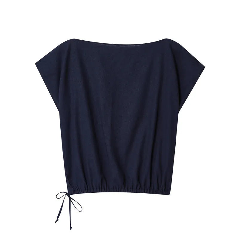Women's linen blend two-piece set showing off-neck blouse with flounced sleeves and wide leg trousers
