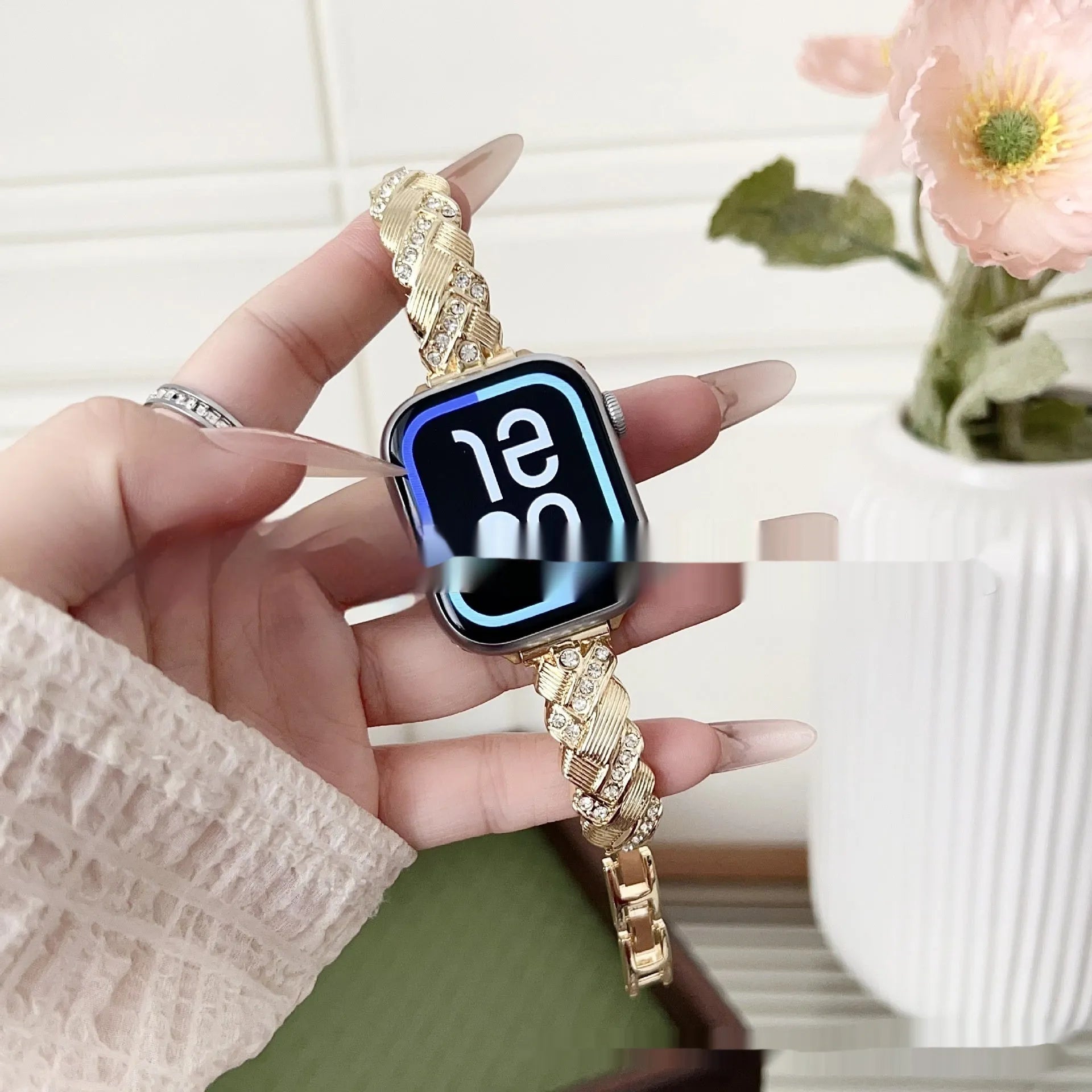 Close-up of a twist diamond pattern metal watch strap for Apple Watch in multiple colour options.