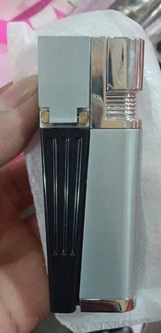 Silver and black foldable metal pipe lighter with stash compartment closed.