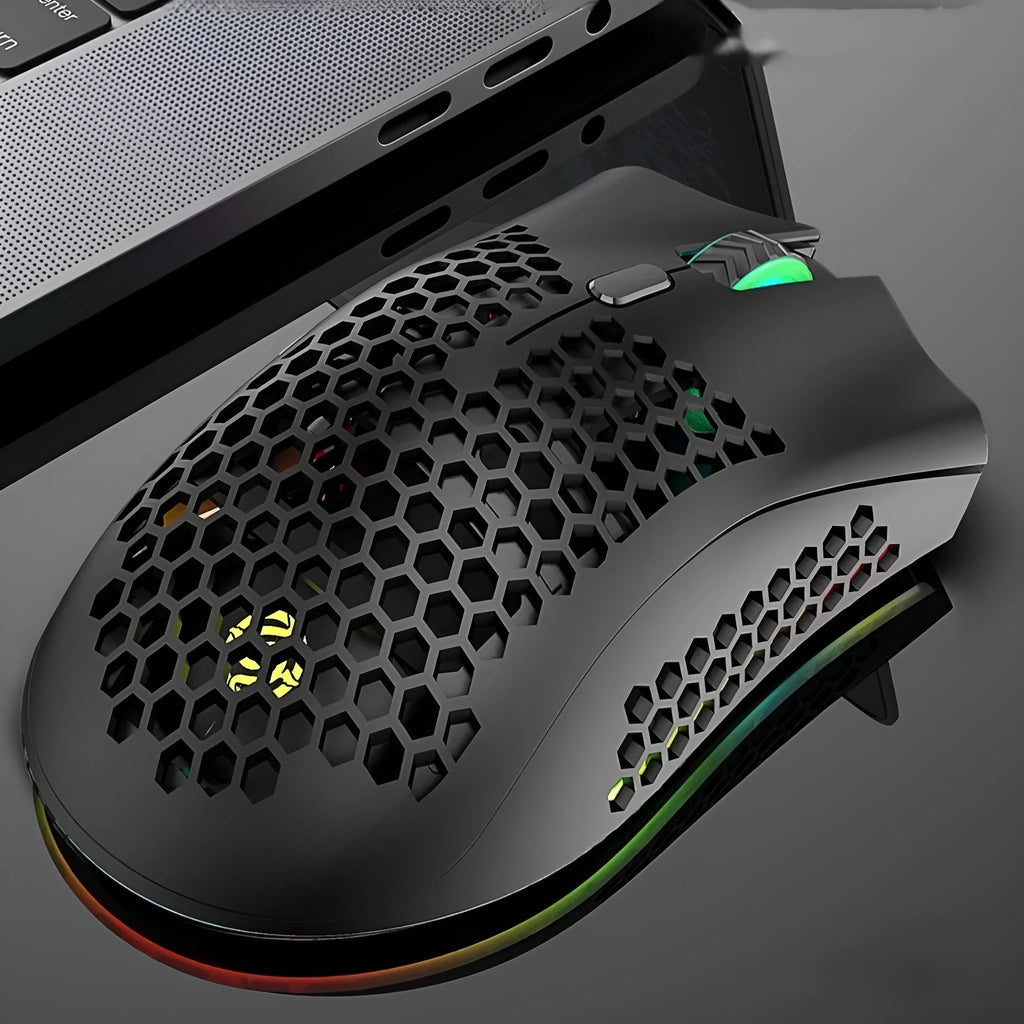 Wireless gaming mouse with hollow-out shell showing RGB lighting through openings