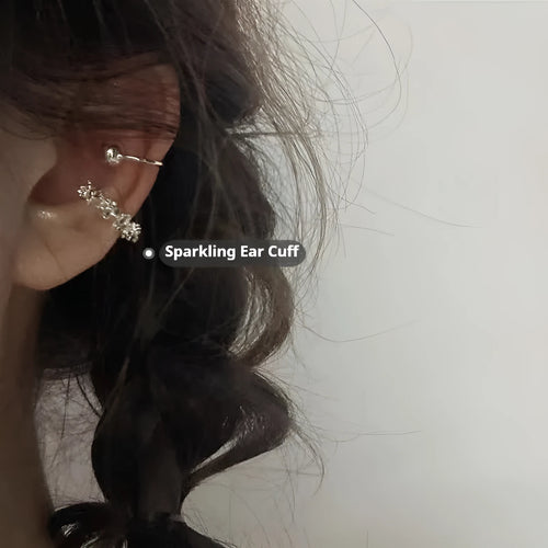 A pair of alloy clip-on earrings with an irregular geometric shape and frosty B4710 colour.
