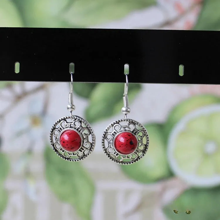 Handmade Miao silver turquoise earrings with geometric flower disk design and ethnic patterns in choice of colours