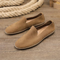 Handmade low-top men's shoes in khaki with a wedge flat heel and rubber sole.