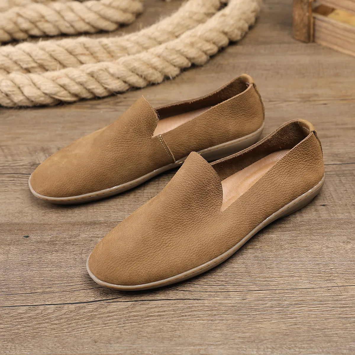 Handmade low-top men's shoes in khaki with a wedge flat heel and rubber sole.