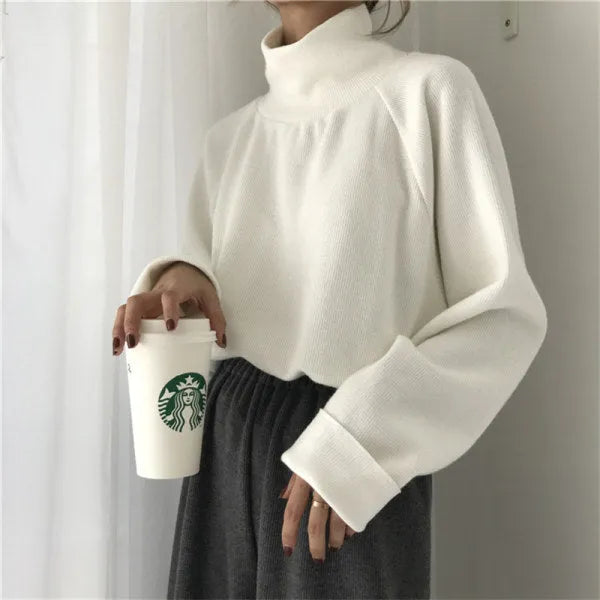 Women's half-high collar long sleeve top in solid colour polyester fabric with loose fit design