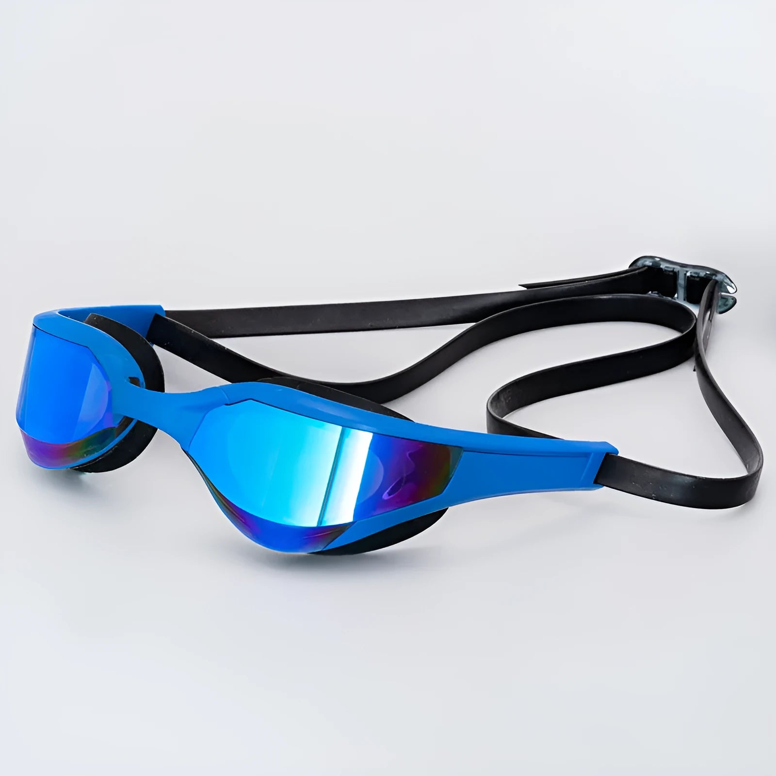 Racing style swimming goggles with mirror lenses and adjustable nose bridge on a blue background.