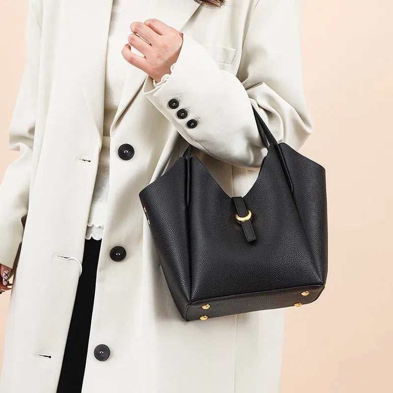Genuine leather women's bucket bag in European retro style with hand holding strap