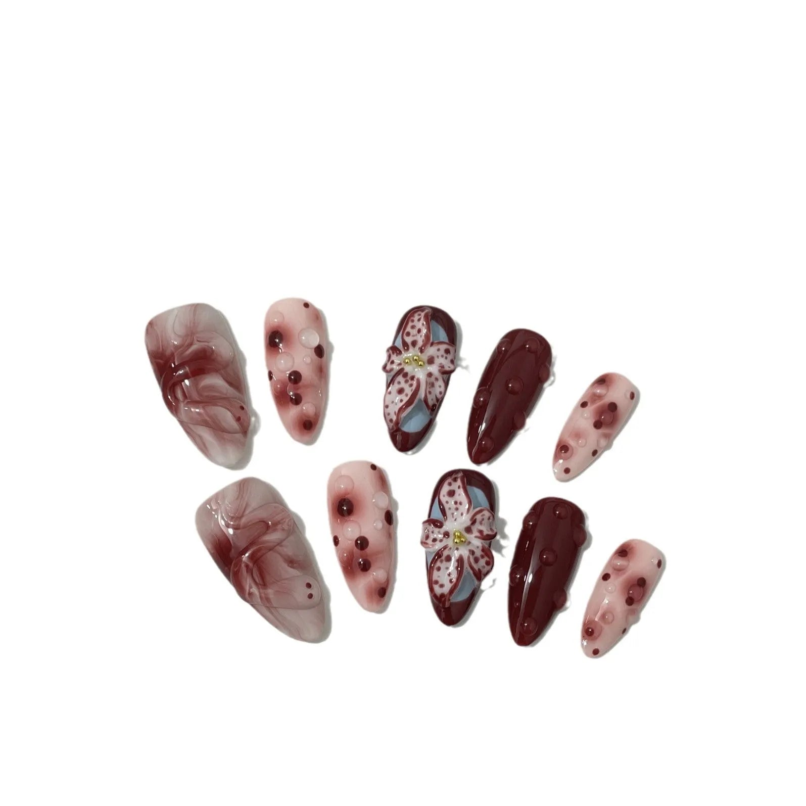 Hand-painted three-dimensional carved almond colour wear nails showing rose pattern in medium length