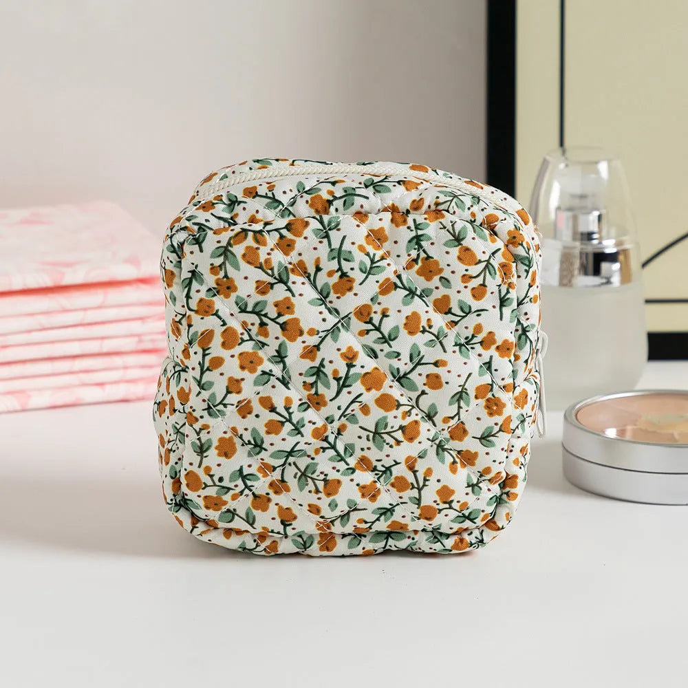 Breathable polyester key storage bag showing multiple floral and cherry pattern options including white background designs
