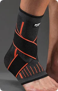 Black sports ankle support strap with Velcro fastener, shown unwrapped.