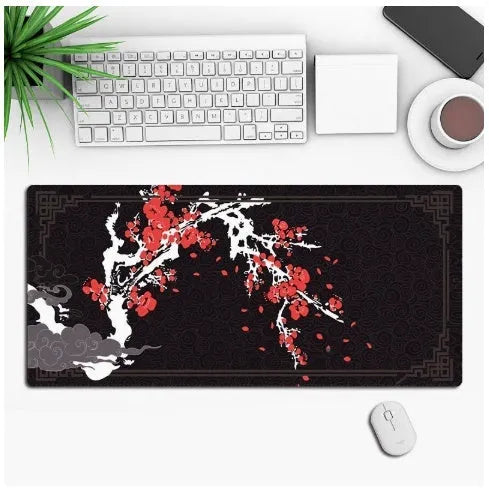 Anime-themed gaming mouse pad on a desk, showing non-slip rubber base and printed cloth surface.