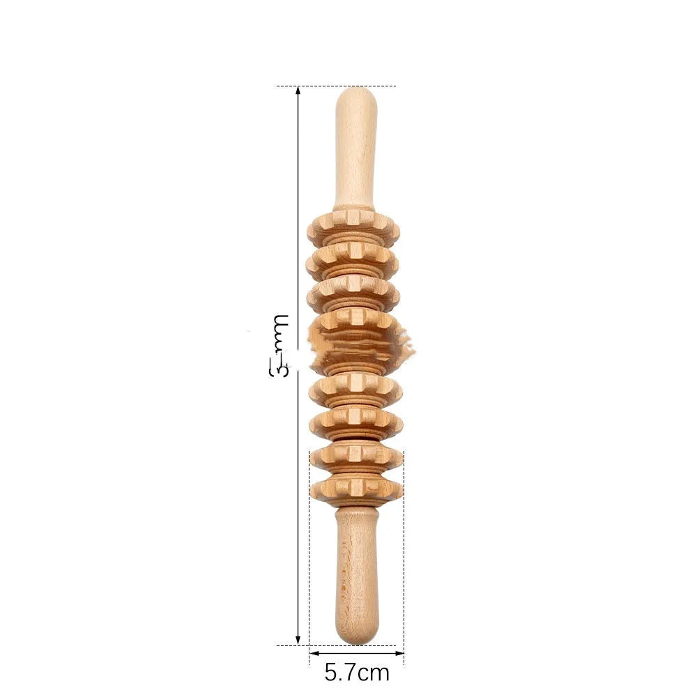 A selection of natural beechwood massage rollers including T-shaped and multi-wheel designs on a wooden surface.