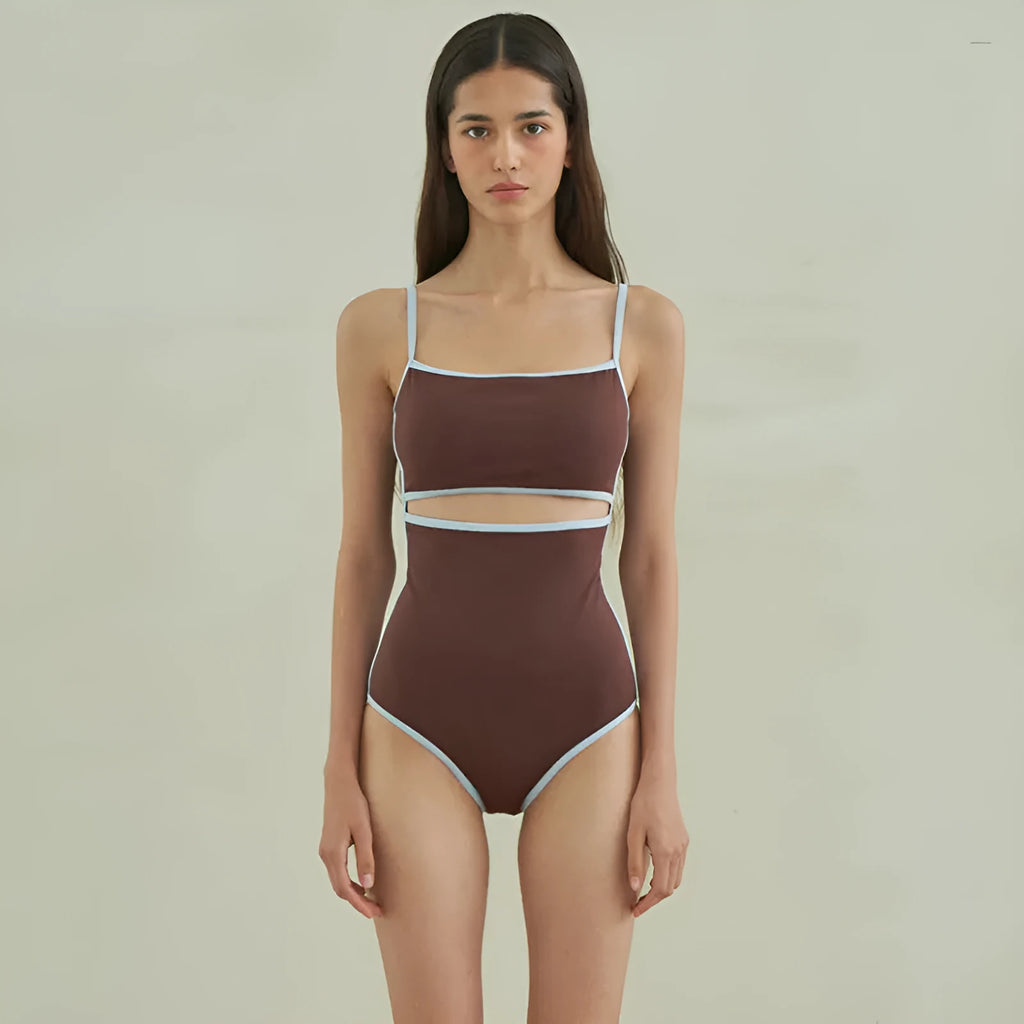 Brown triangle one-piece swimsuit for women on a hanger.