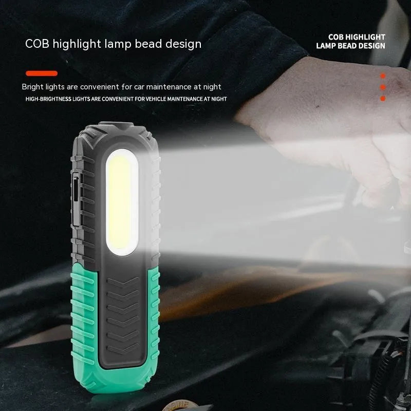 Black and green USB rechargeable auto repair work light with compact dimensions