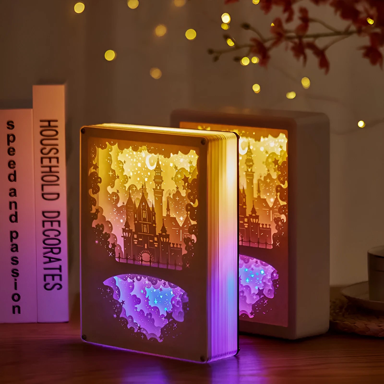 Bedside night light with paper carving design and remote control on wooden nightstand