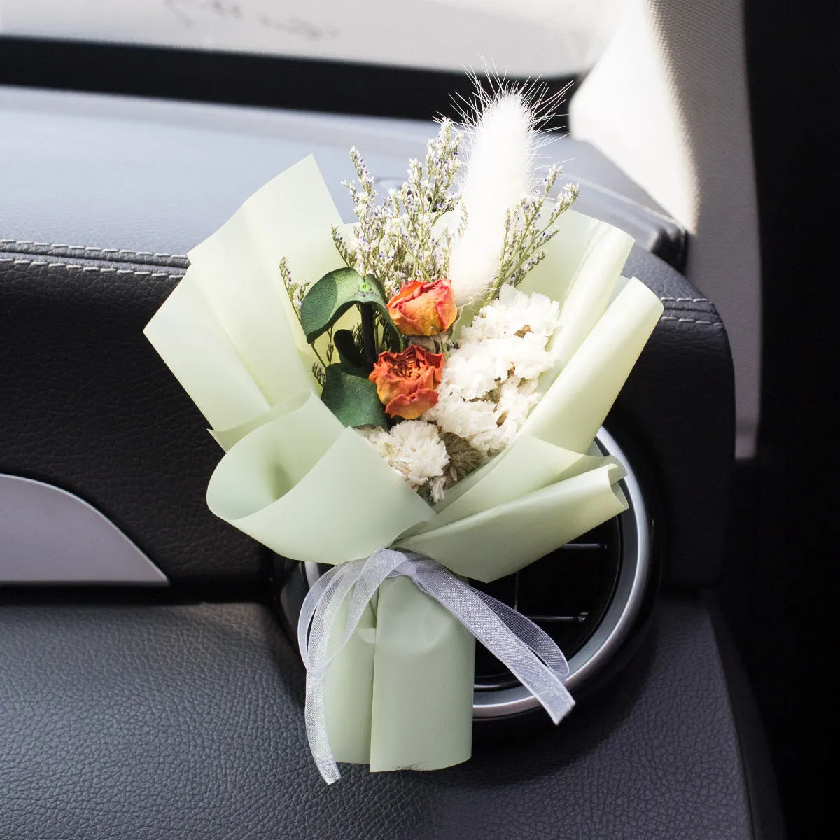 Handmade dried flower car vent ornament with interchangeable scented discs in multiple colour options