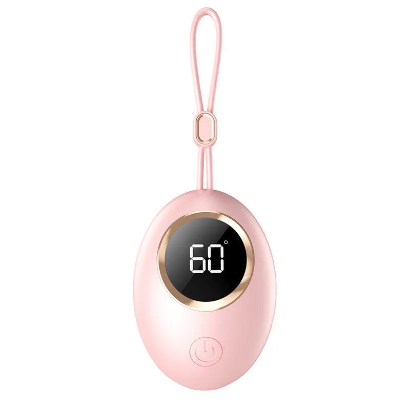 USB digital display hand warmer in pink, showing aluminium heating pad and screen