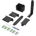 White ABS plastic wall hook holding a game controller and a black gaming headset.