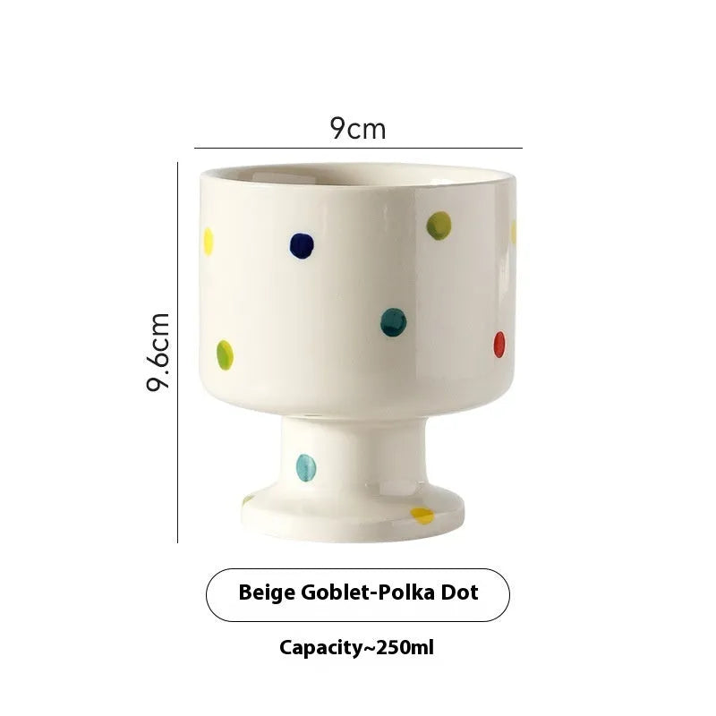 Handmade ceramic mug with irregular shape in solid colour