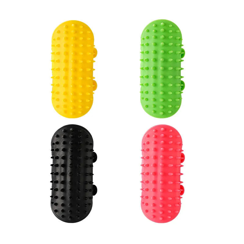 Silicone cat grooming comb with adjustable strap fastened to a table leg for self-cleaning