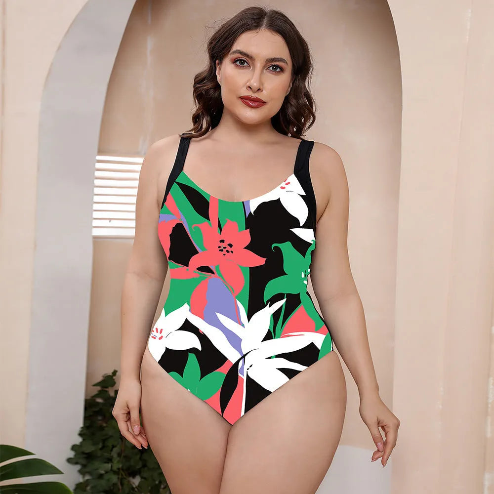 Women's vest style one-piece floral print swimsuit with spaghetti straps on a mannequin.