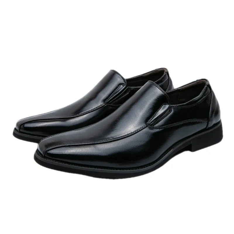 Men's black pointed leather casual shoes with flat rubber sole, shown from side
