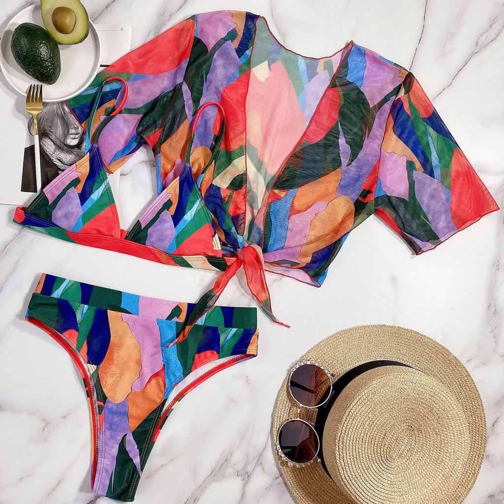Red printed split swimsuit bikini for women on a mannequin