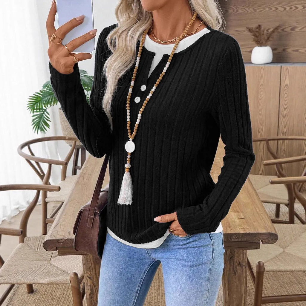Women's grey fake two-piece striped pullover sweater with round neck and button detail.