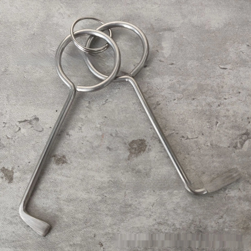 Two alloy wrench tools from a portable universal family toolkit set on a white background.