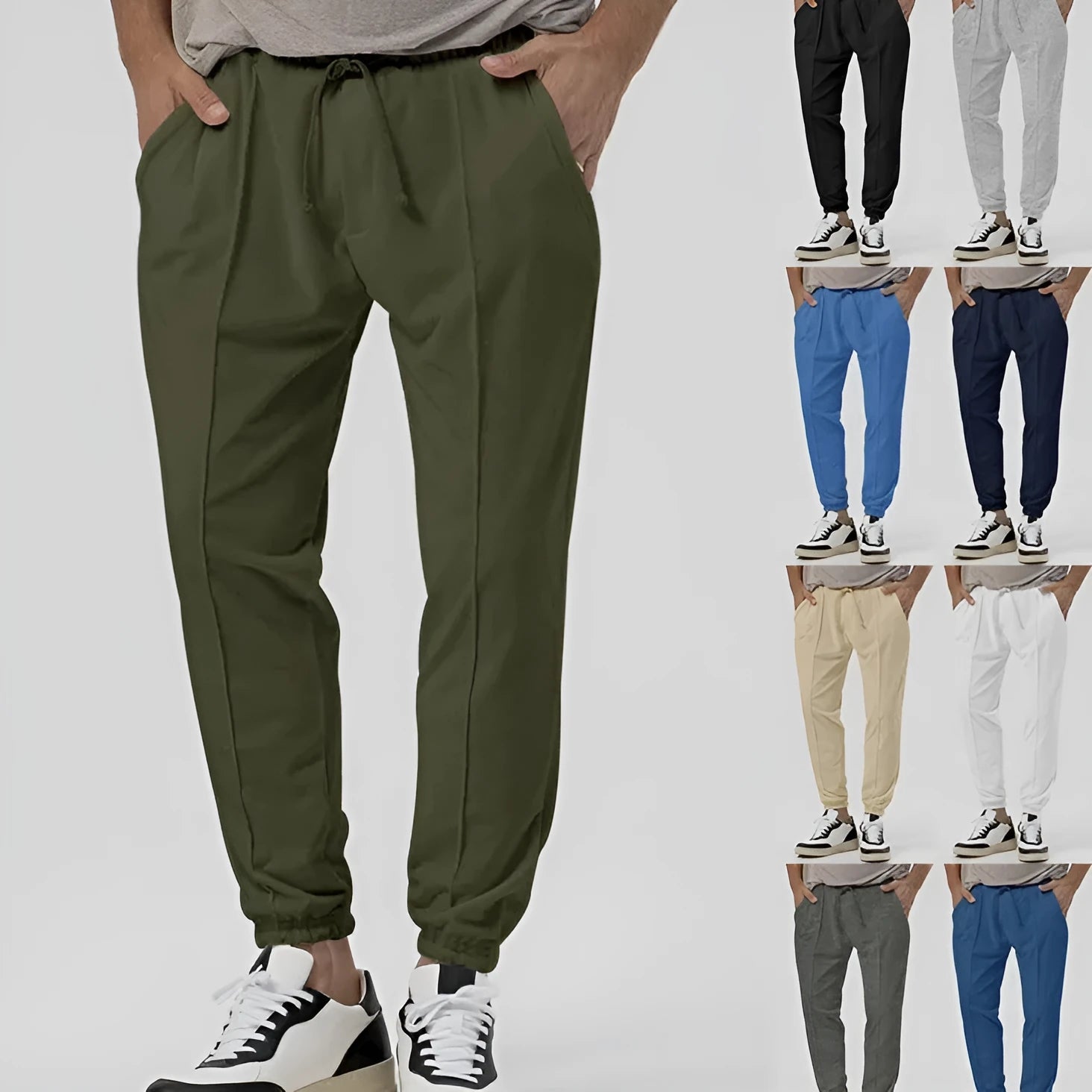 Men's loose tapered casual sweatpants in a grey cotton blend fabric with an elastic waistband.