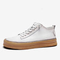 Men's black leather casual lace-up shoes with a round toe and flat rubber sole on a white background.