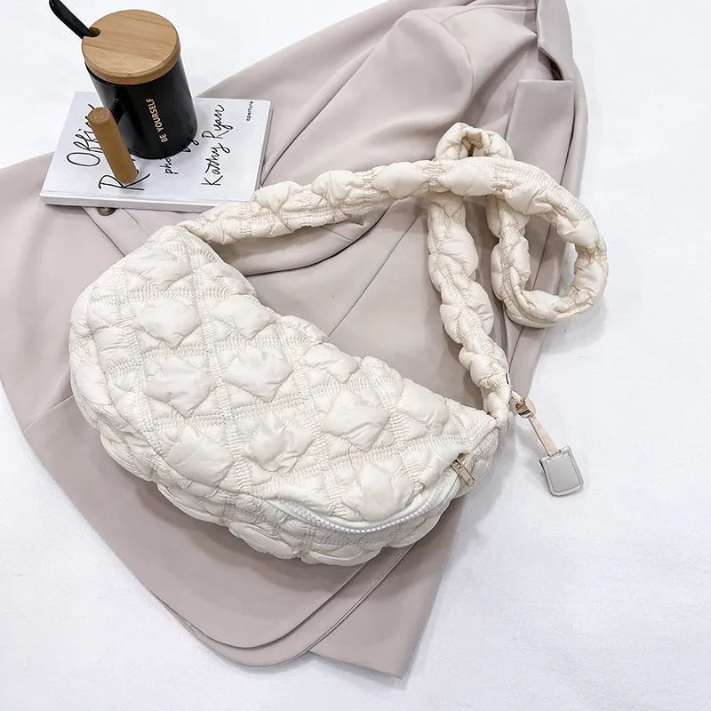 Women's nylon shoulder messenger bag in beige colour showing dimensions and adjustable strap