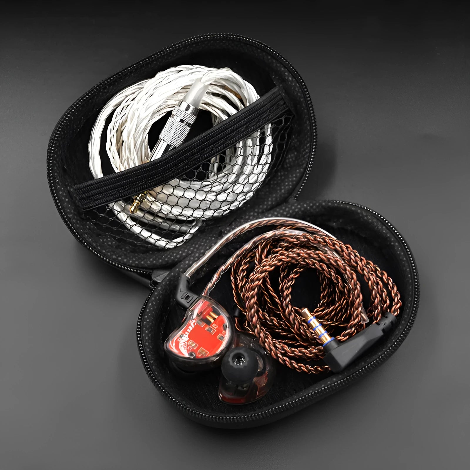 Black oval leather earphone storage bag with zip closure for EDX PRO and compatible models