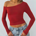 Women's slim fit knitted cardigan in solid colour with cross shoulder straps and long sleeves