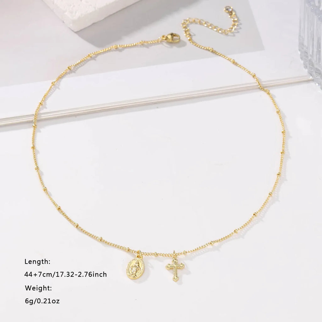 Gold Virgin Mary and cross geometric pendant necklace on a chain